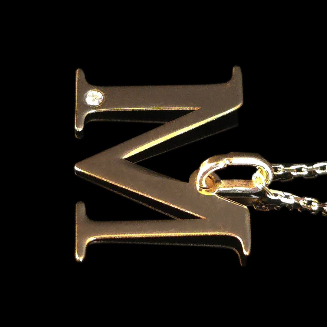 Geltono aukso grandinėlė su M raidelės pakabuku