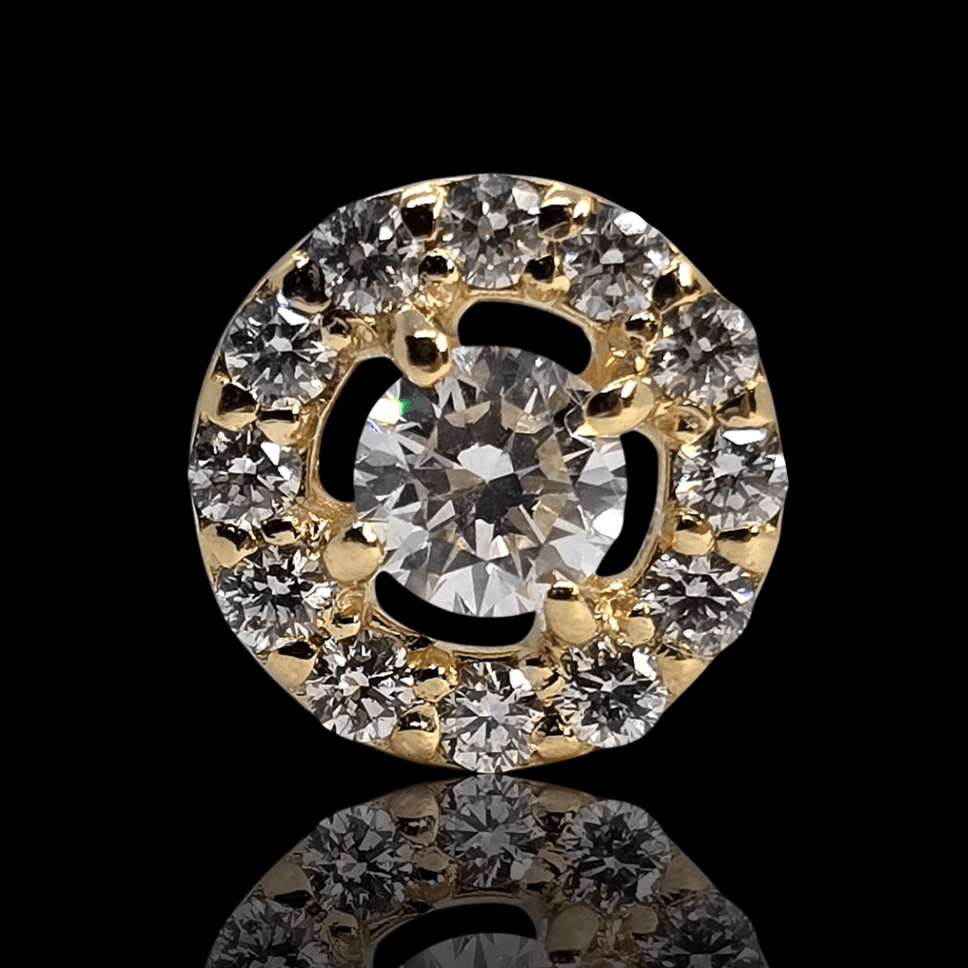 Geltono aukso pakabukas su deimantais ratuku