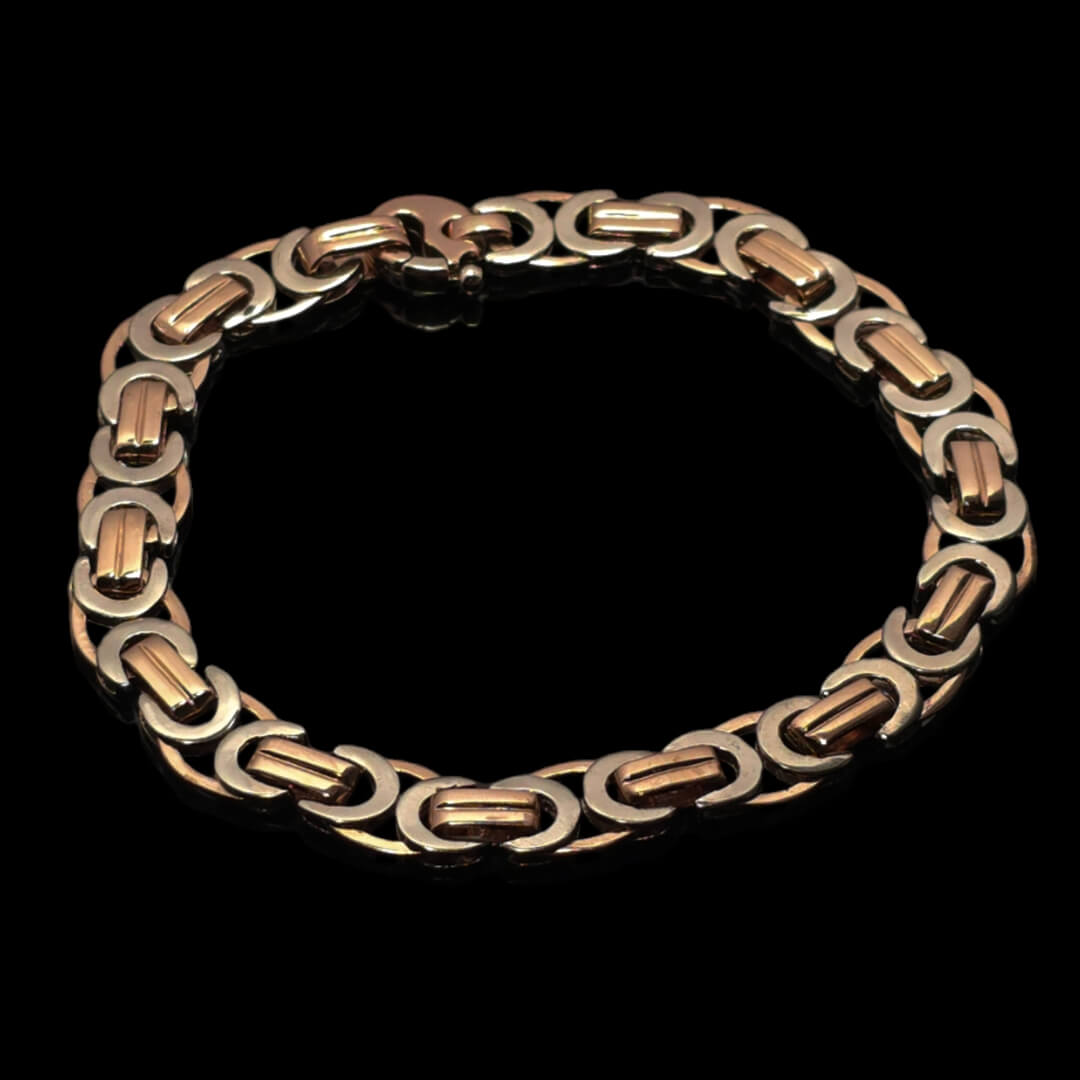 Raudono ir balto aukso apyrankė