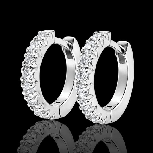 Balto aukso rinkes su briliantais