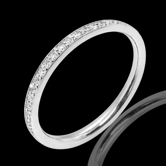 Balto aukso žiedas su deimantais ratuku