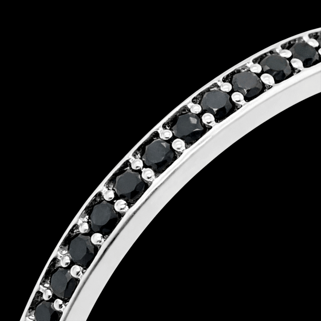 Balto aukso žiedas su juodais deimantais ratuku