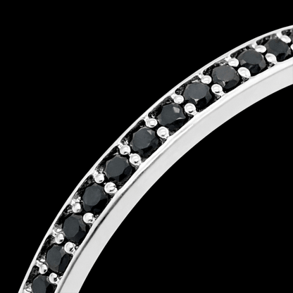 Balto aukso žiedas su juodais deimantais ratuku