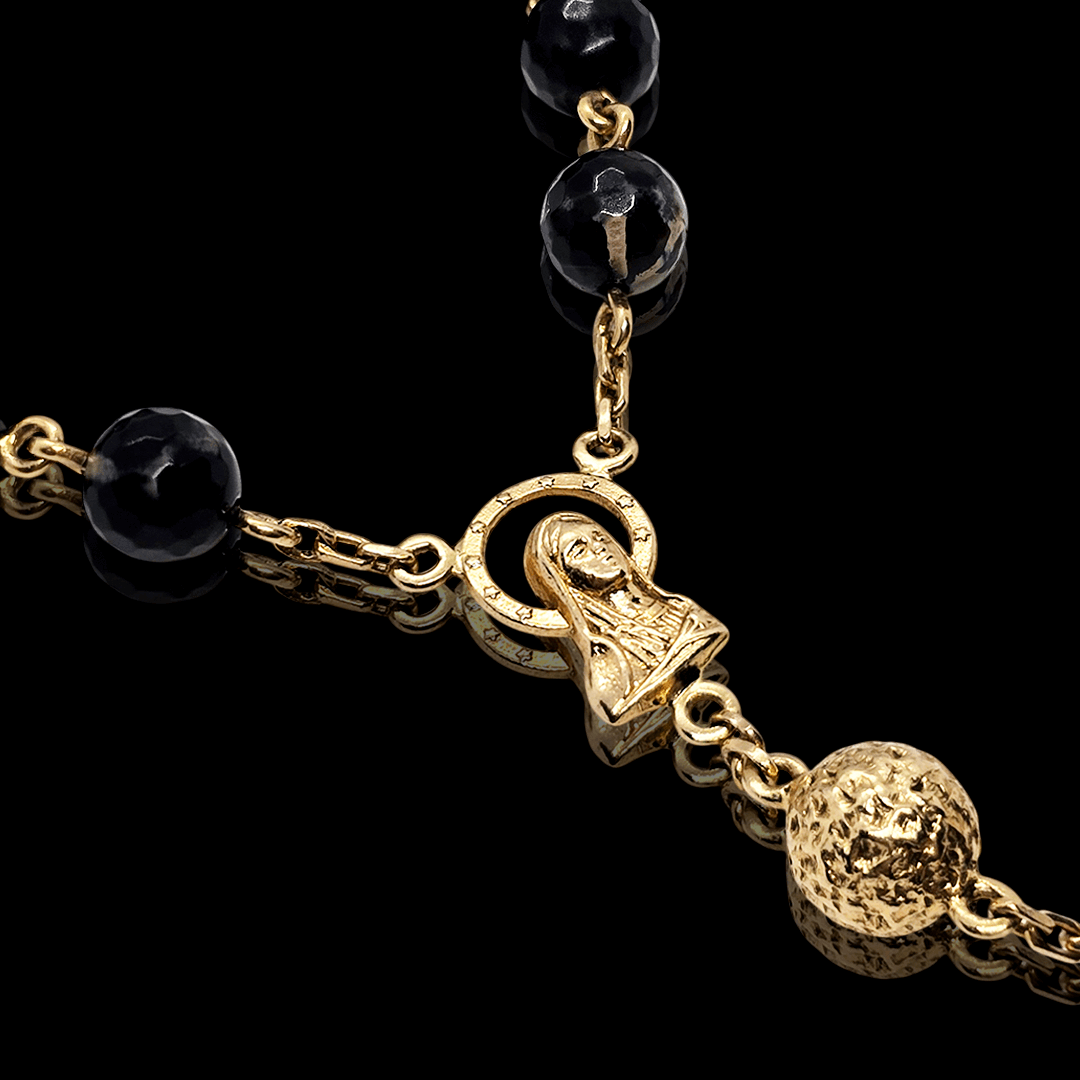 Geltono aukso rožančius