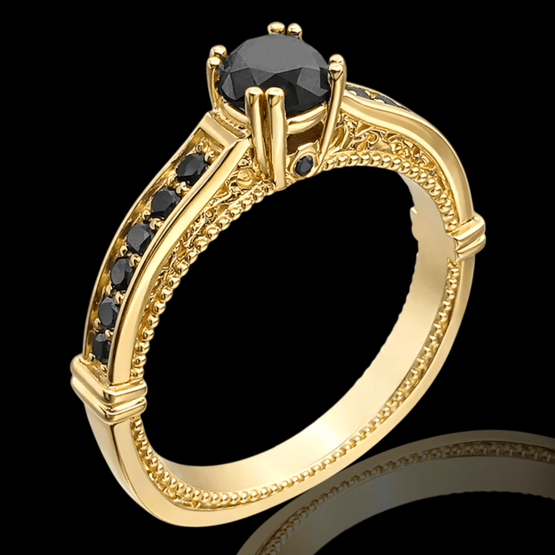 Geltono aukso žiedas su juodais briliantais