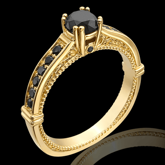 Geltono aukso žiedas su juodais briliantais