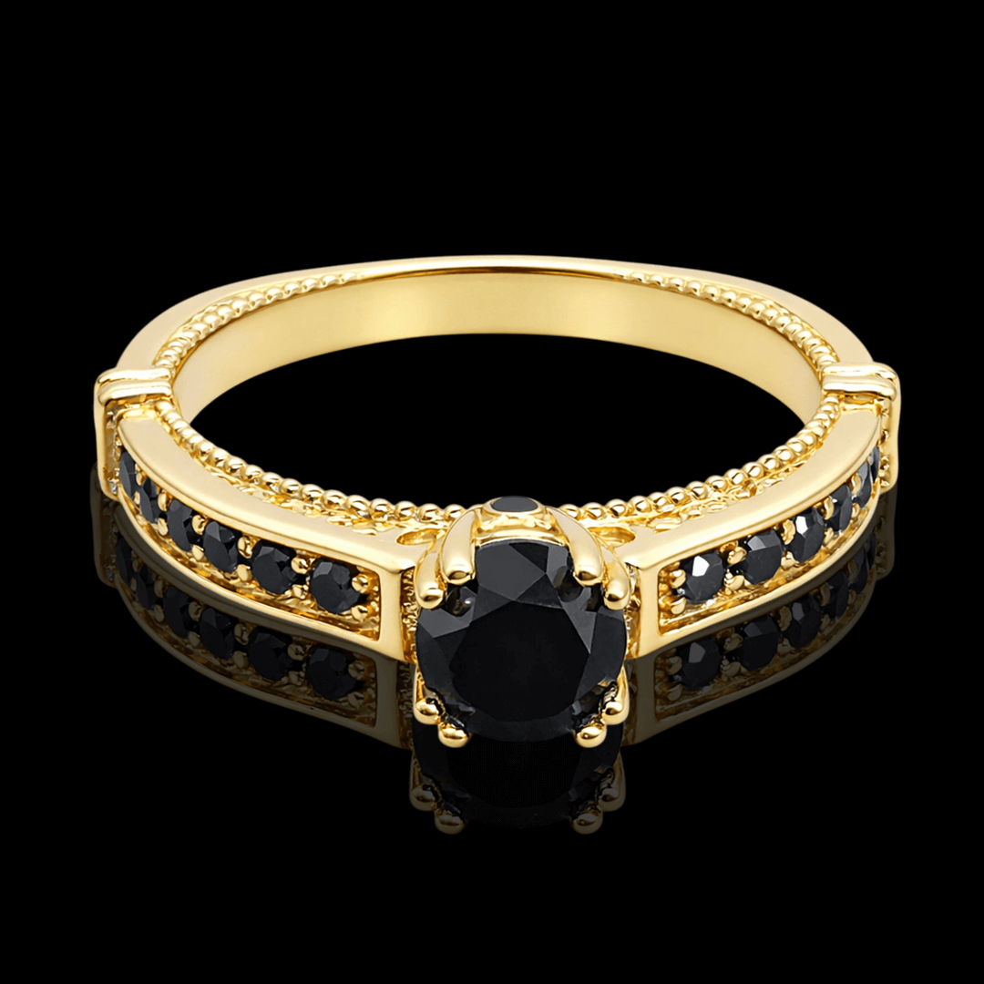 Geltono aukso žiedas su juodais briliantais