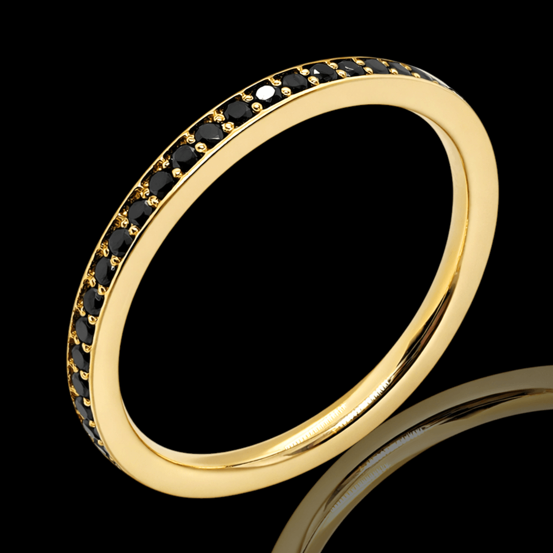 Geltono aukso žiedas su juodais deimantais ratuku