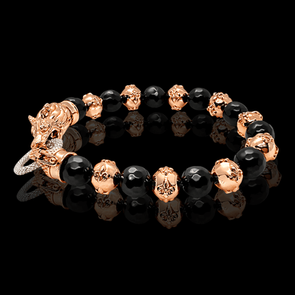 Raudono aukso apyrankė su oniksu