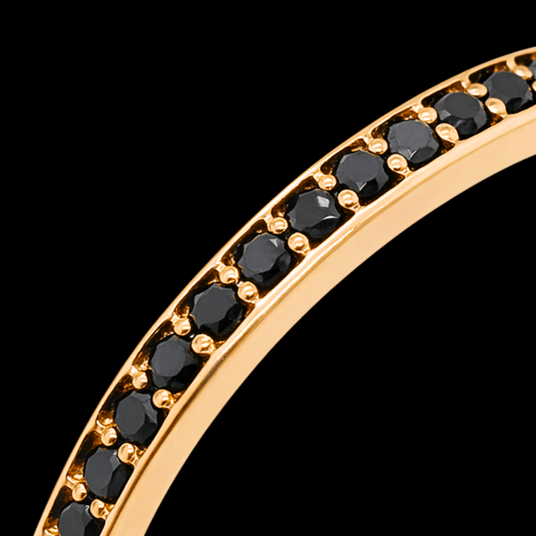 Raudono aukso žiedas su juodais deimantais ratuku