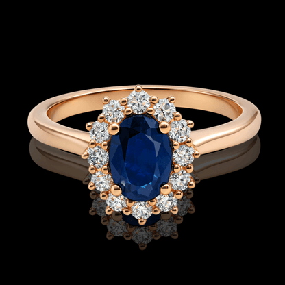 Raudono aukso žiedas su deimantais ir safyru