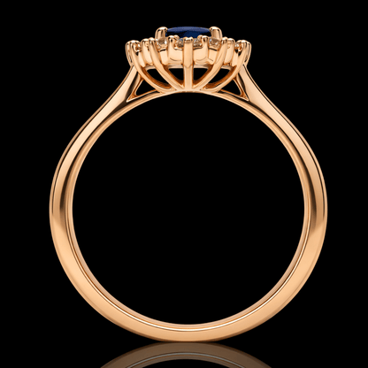 Raudono aukso žiedas su deimantais ir safyru