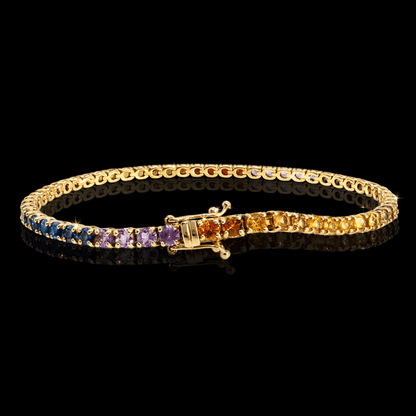 Geltono aukso "Tennis" apyranke su spalvotais safyrais