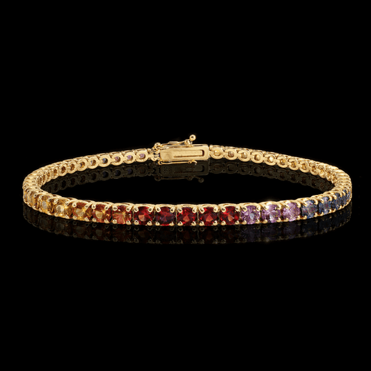 Geltono aukso "Tennis" apyranke su spalvotais safyrais